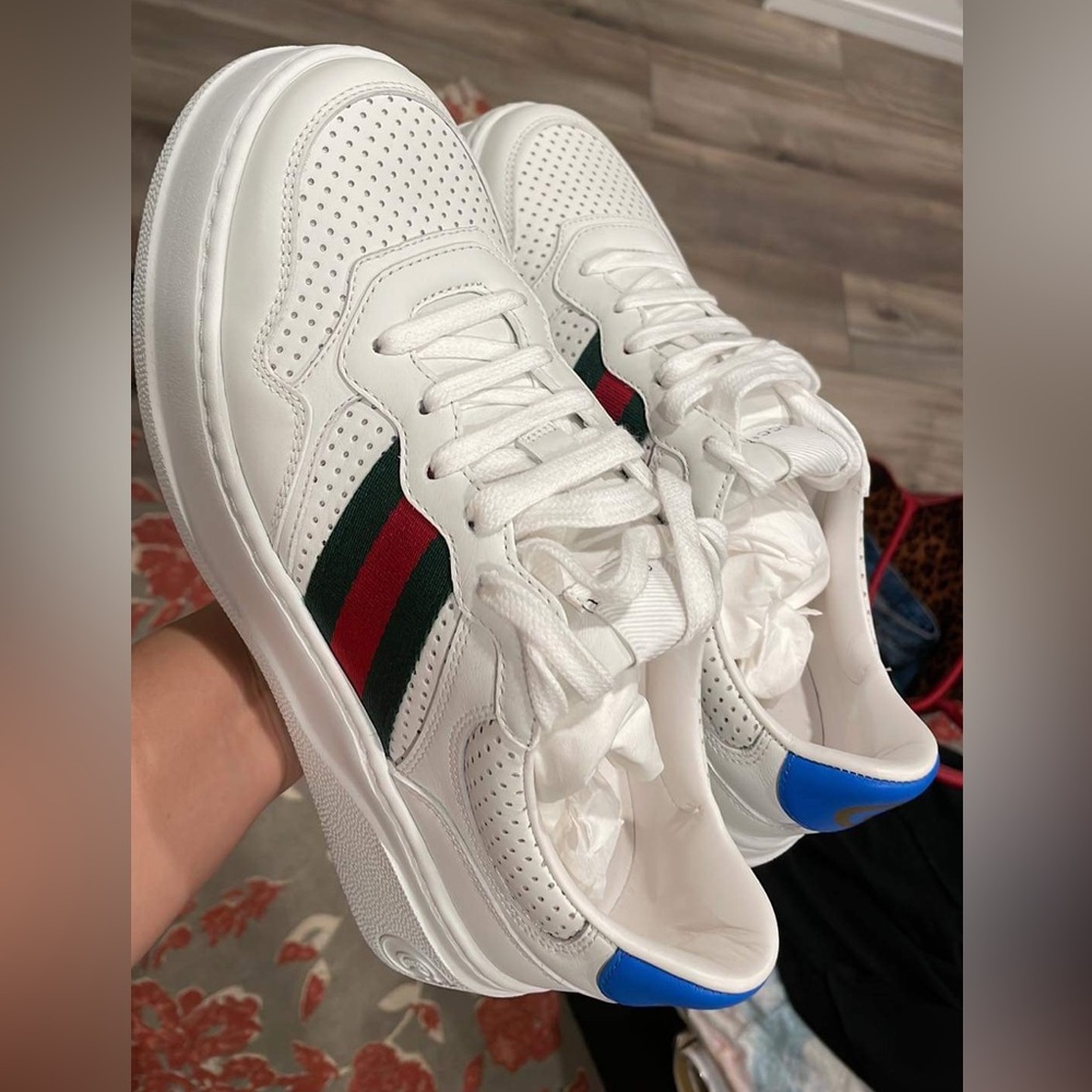 Gucci sneaker is excellent condition 100%, have box with everything.